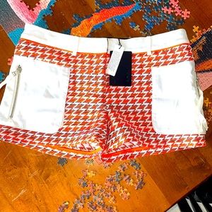 L.A.M.B. Shorts size 4 with zip pockets, vintage style embroidered detail